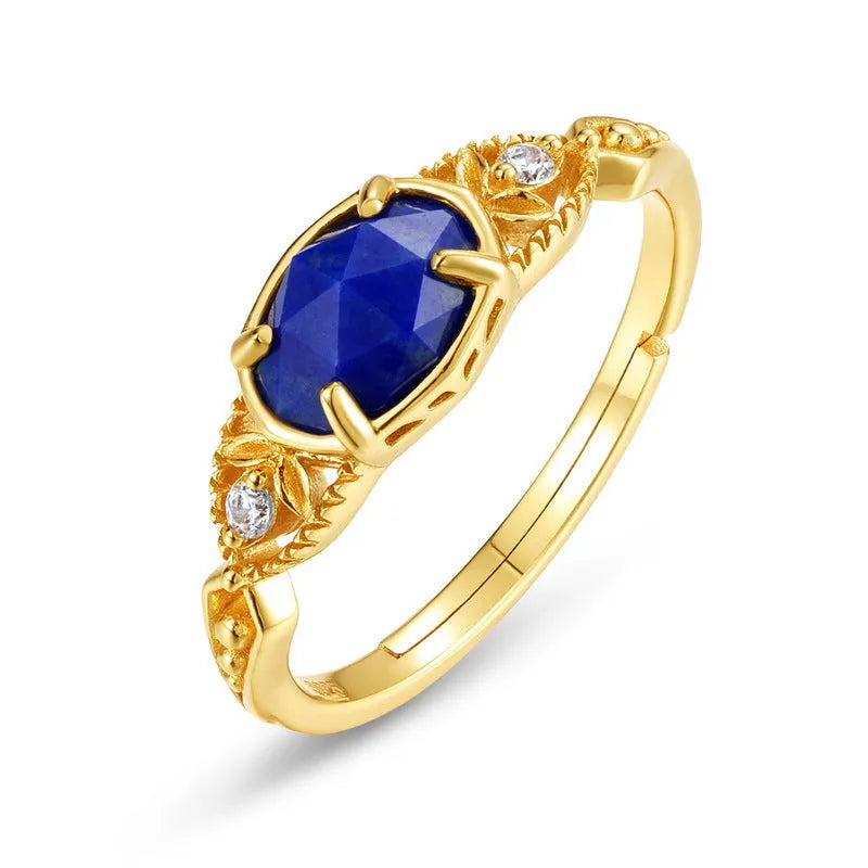 Silver geometric ring with oval lapis lazuli stone showing blue forest night sky pattern