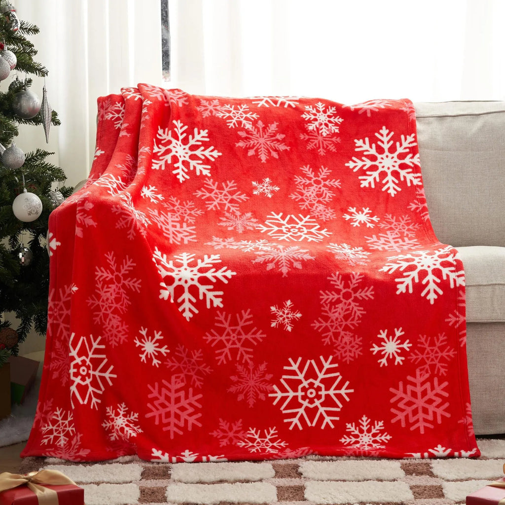 Soft flannel Christmas blanket in a plush polyester fabric, shown in one of five colour options.