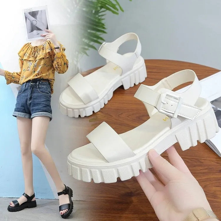 Women's beige peep toe platform sandals with an ankle-strap buckle on a white background.