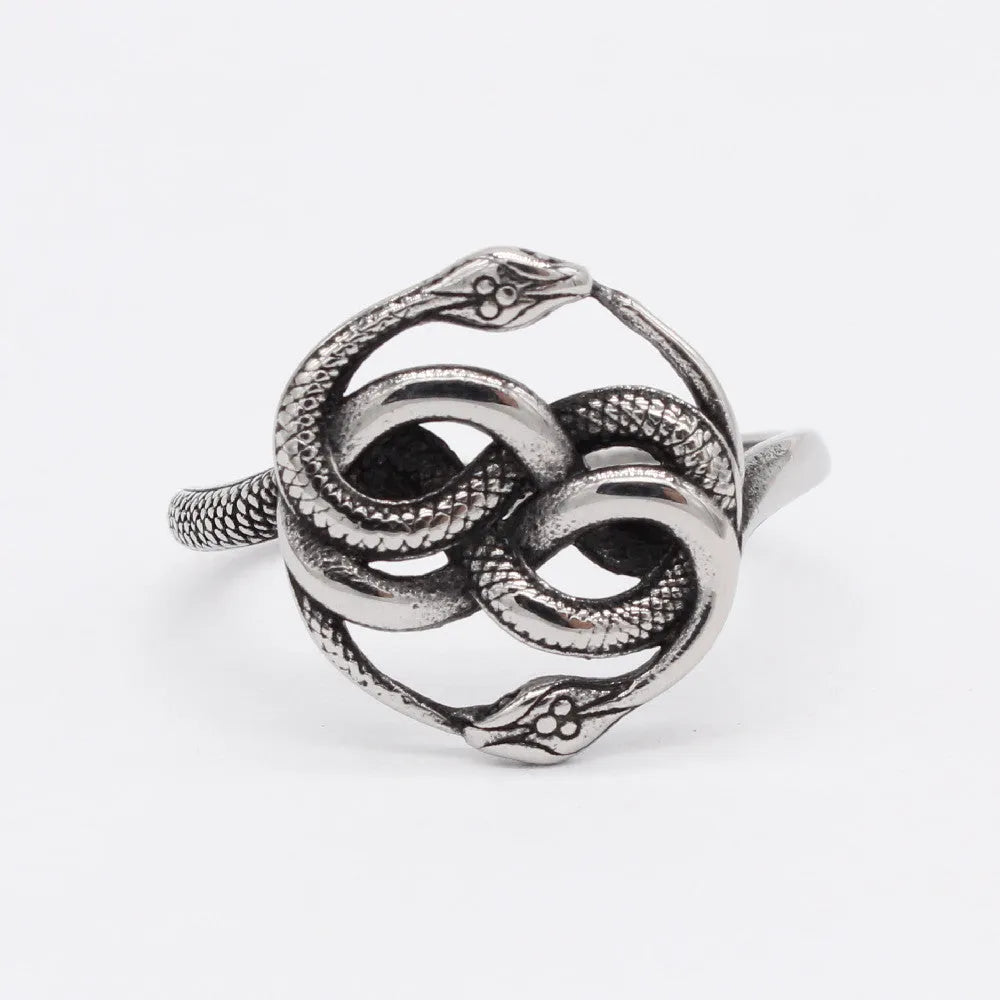 Personalised titanium steel double snake ring in steel colour on a grey background.