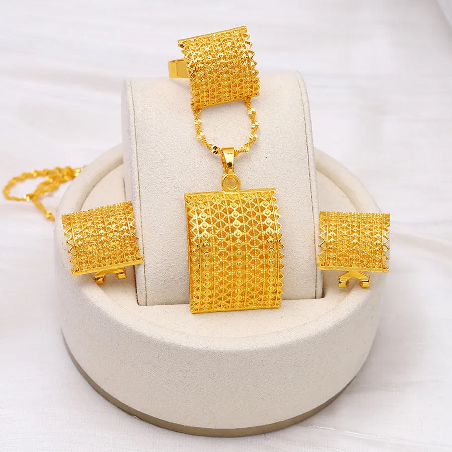 Golden bridal jewellery set with copper necklace, earrings, and ring for wedding occasions
