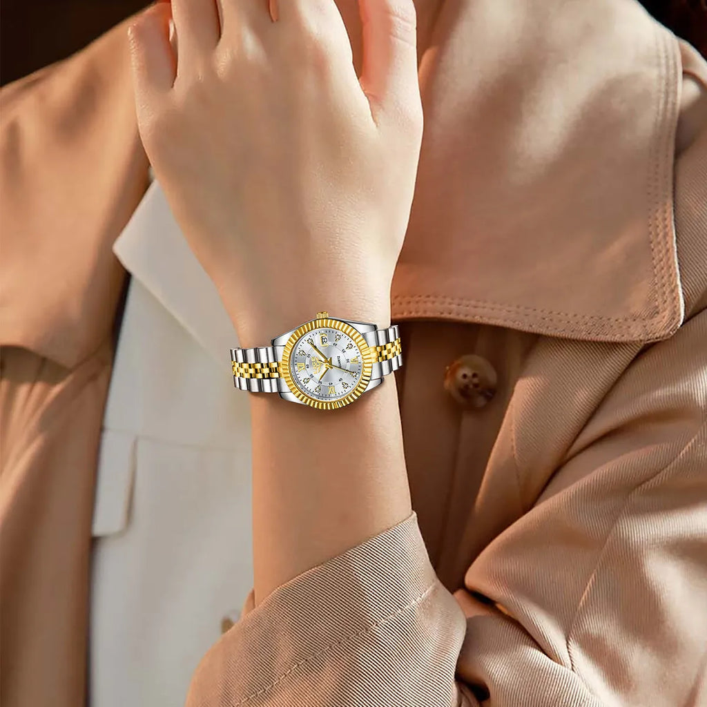 Slim gold and silver ladies quartz fashion watch with multiple dial colour options on a wrist.