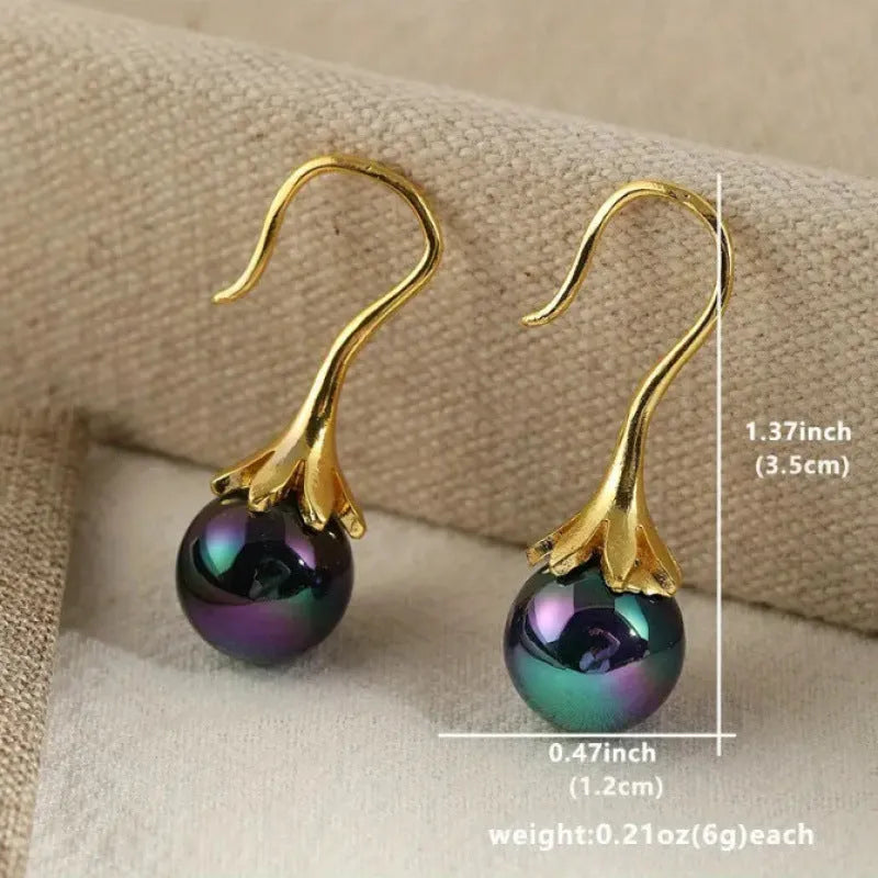 Gold electroplated retro fashion women's earrings with alloy construction and personalised creative design