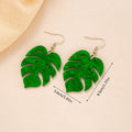 Women's drop earrings with a colourful acrylic coconut jackfruit charm on a metal hook.