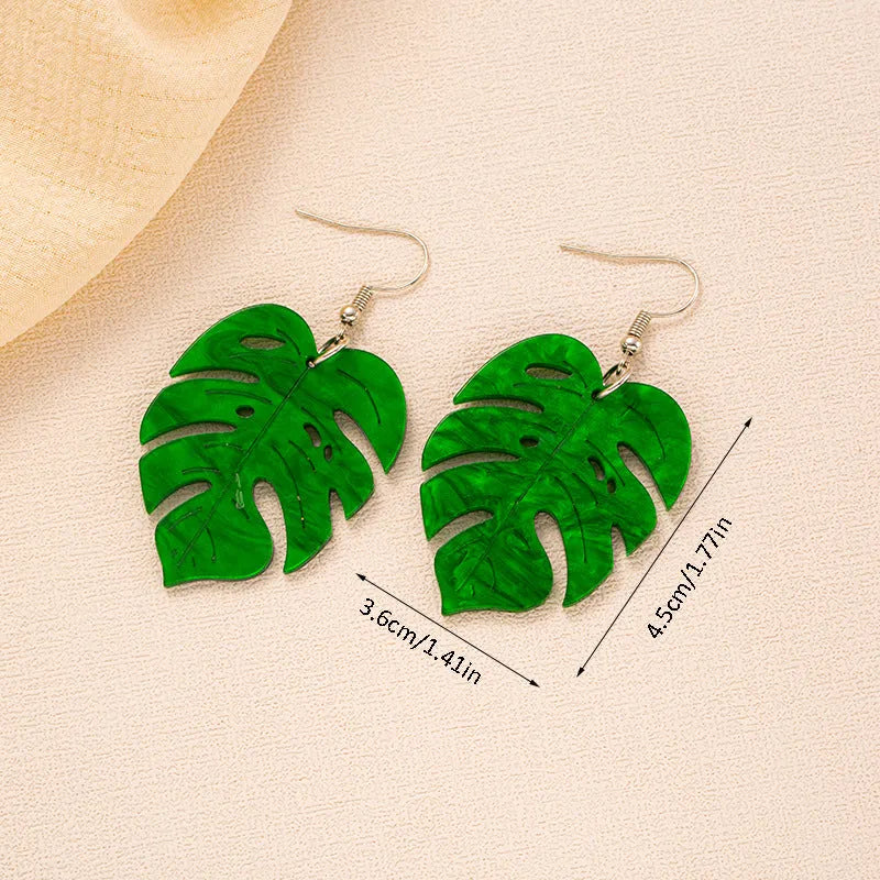 Women's drop earrings with a colourful acrylic coconut jackfruit charm on a metal hook.