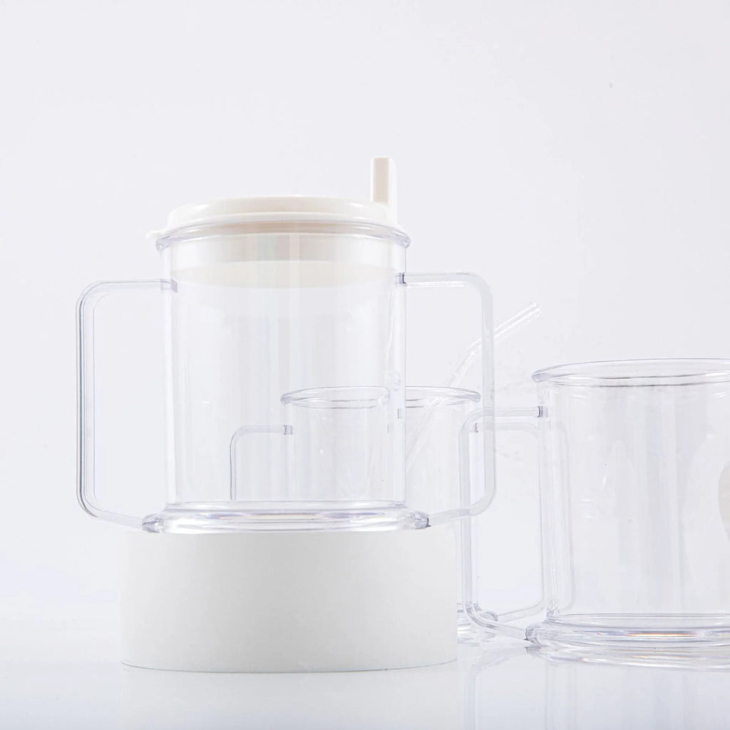 Transparent plastic drinking cup with a simple, modern design on a plain background.