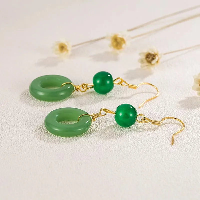 Green and gold Chinese style earrings with cheongsam peace buckle design in geometric shape