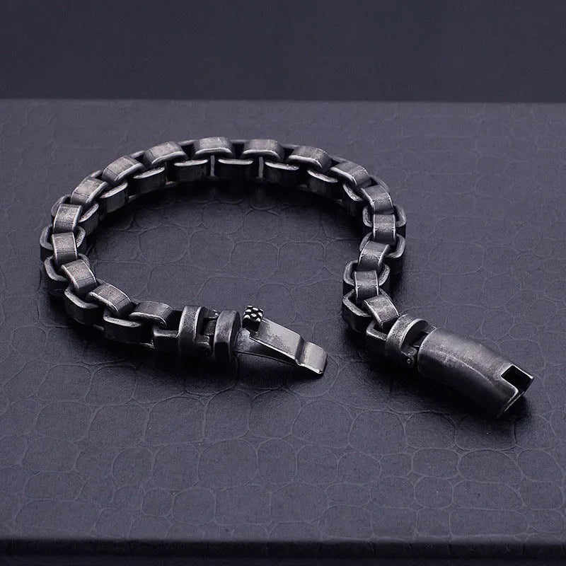 Black titanium steel punk chain bracelet with geometric design, 22cm length, on male wrist