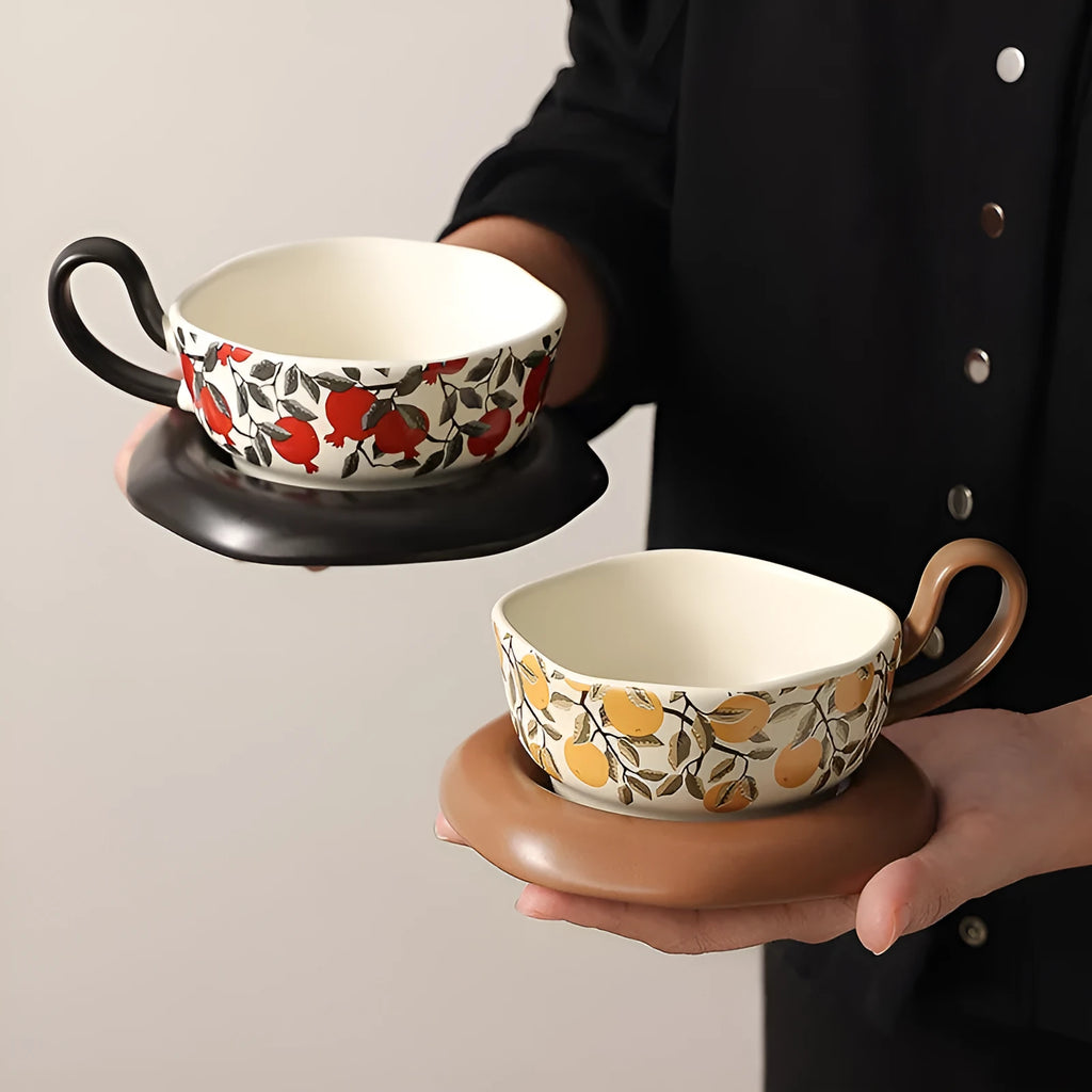 Black and orange antique style ceramic coffee cup and saucer set with 210ml capacity.