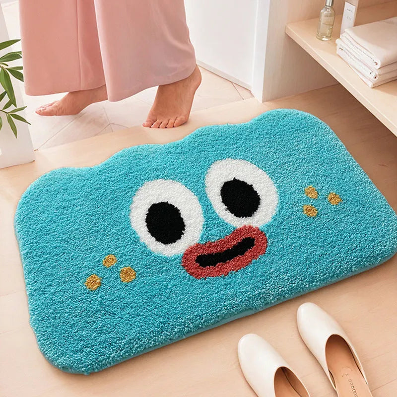 Big eye clouds cartoon print bathroom mat in green, showing soft, thickened polyester fibre pile.
