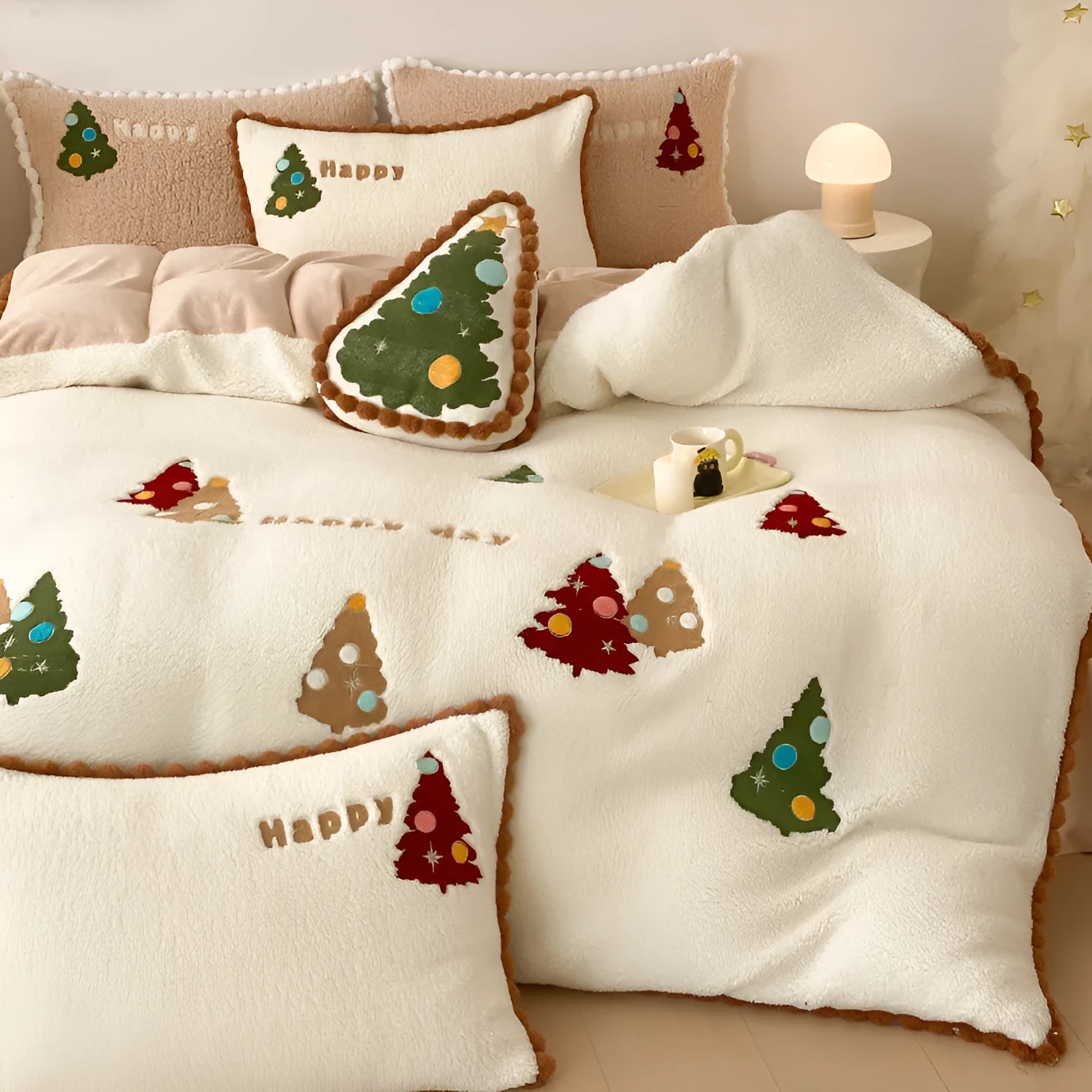 Bright yellow fleece-lined bedding set with embroidered cartoon Christmas trees on duvet cover and pillows.