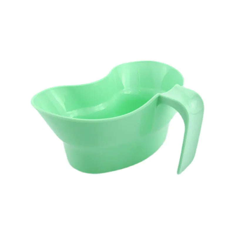 Green plastic nursing care gargle cup for bedridden patient oral hygiene.