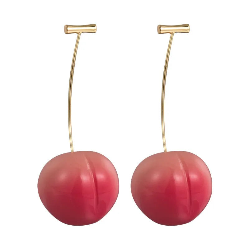 A pair of peach-shaped acrylic earrings on copper posts, shown in a choice of large or small sizes.