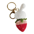 Hand-woven white rabbit strawberry pendant charm made from colourful doll wire on a keyring.