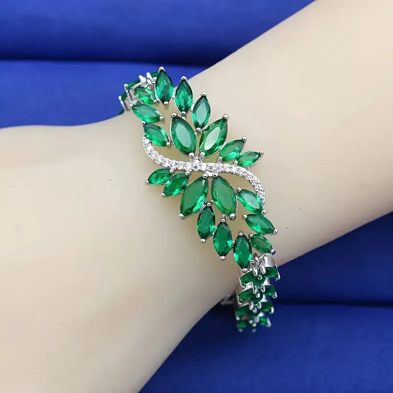 Gold-plated copper bracelet with coloured zircon stones in an ice flower design.