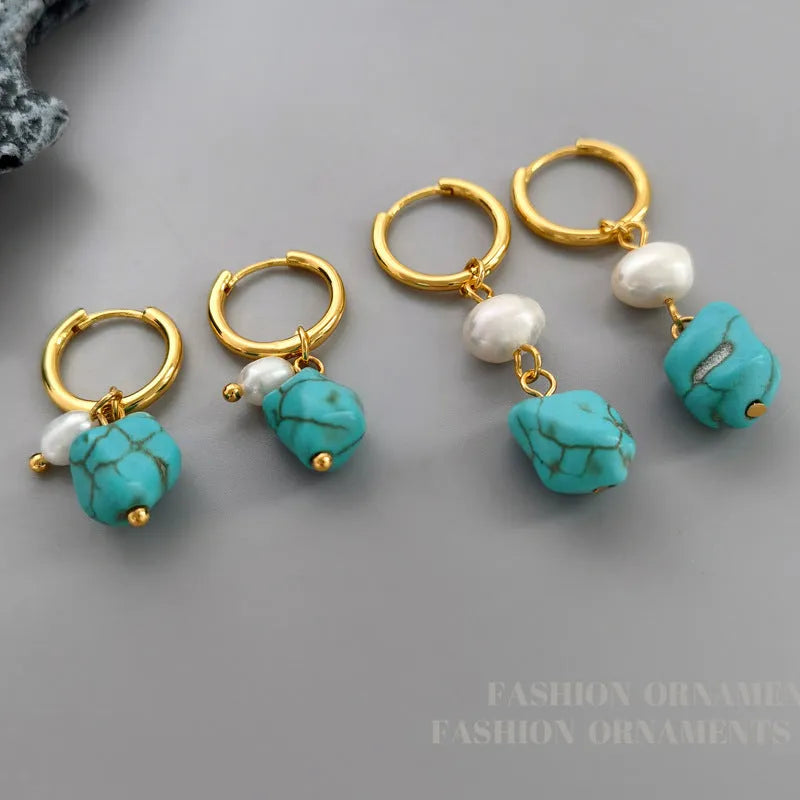 A pair of long and a pair of short geometric earrings with irregular turquoise and cultured pearls on copper ear clips.