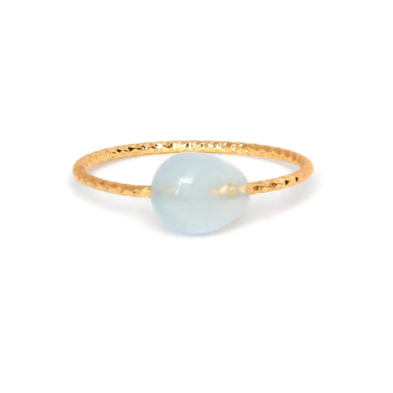 A geometric-shaped agate ring for women in an original design, showcasing natural stone colouration.