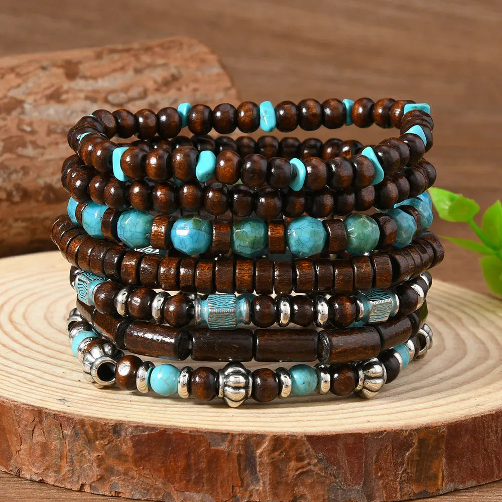 Seven retro bracelets with stone and wooden beads in multicolour set
