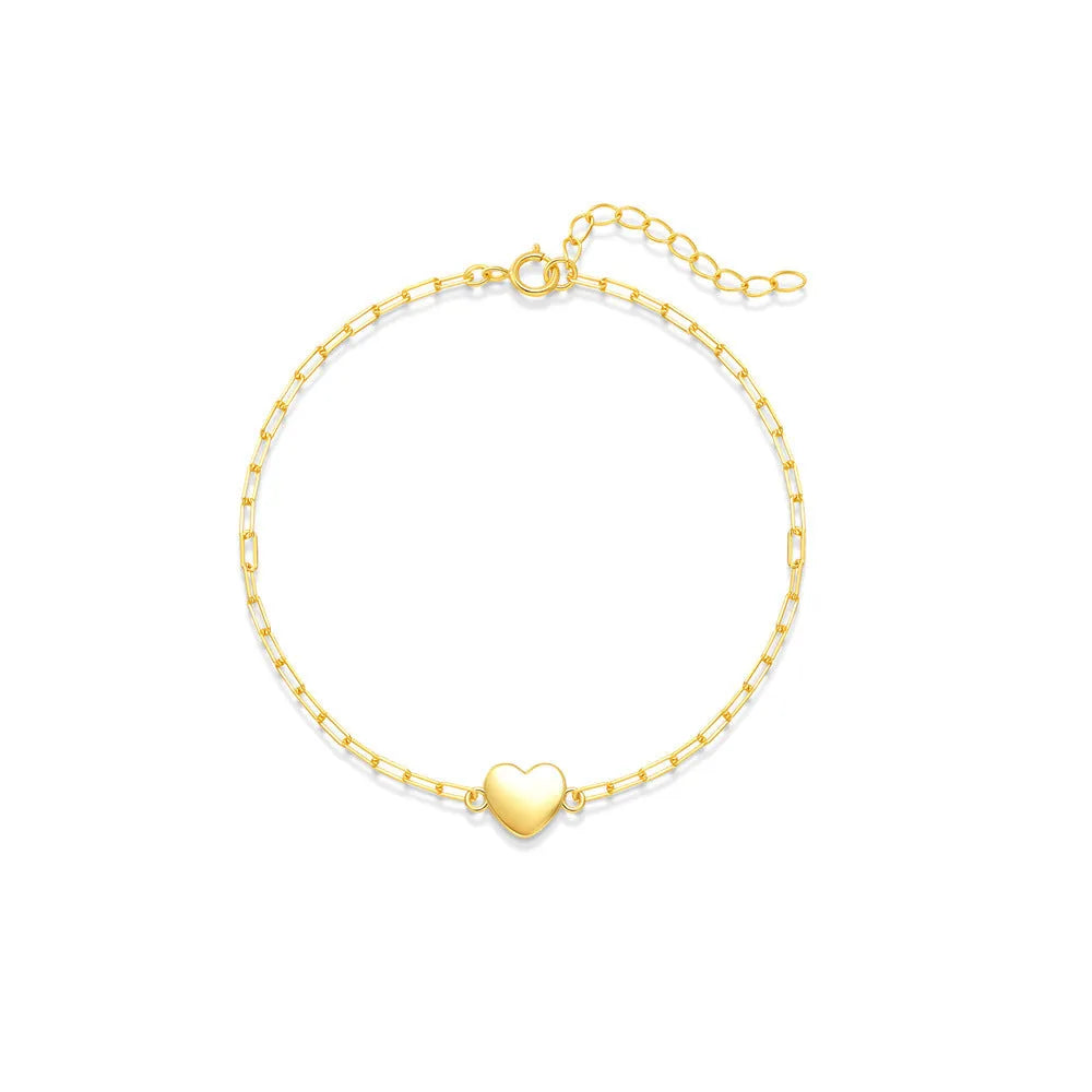 S925 sterling silver bracelet with heart charm and clip chain clasp in gold tone