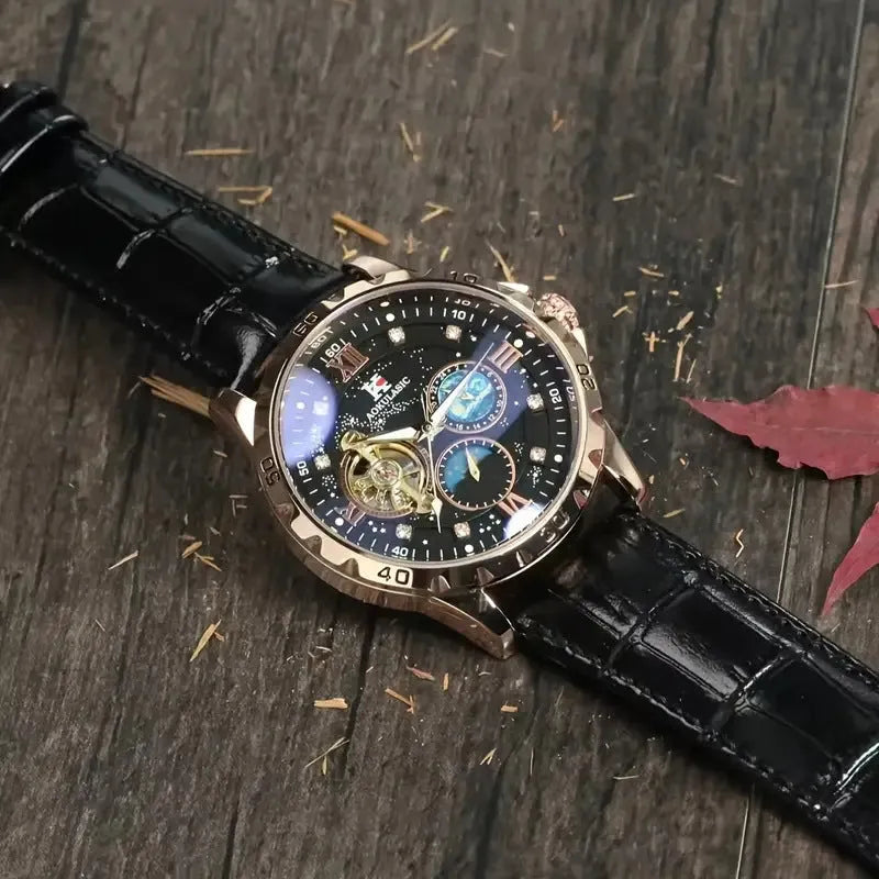 Men's black and rose gold automatic mechanical watch with hollow dial on a black leather strap.