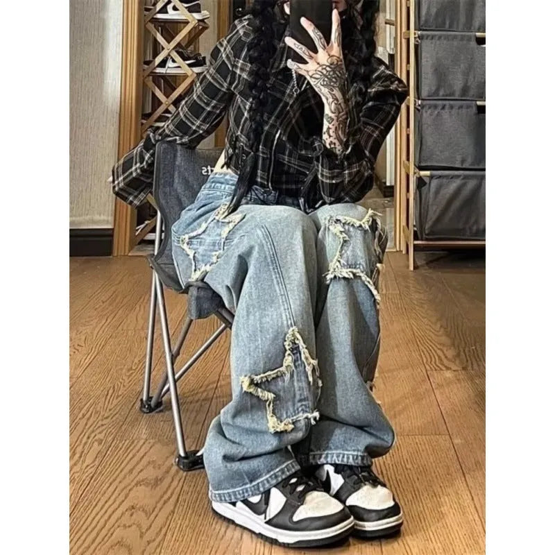 Blue high-waist straight-leg women's jeans on a model, showing the front and side fit.