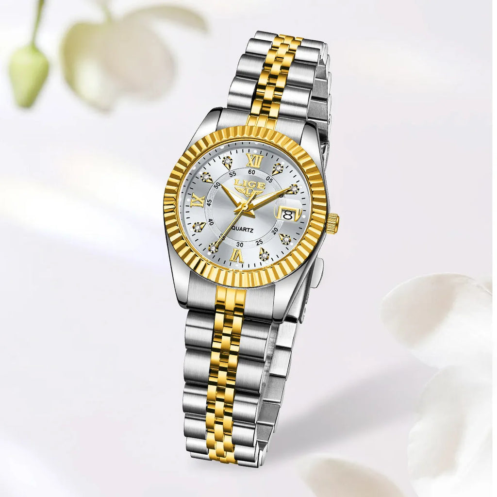 Slim gold and silver ladies quartz fashion watch with multiple dial colour options on a wrist.