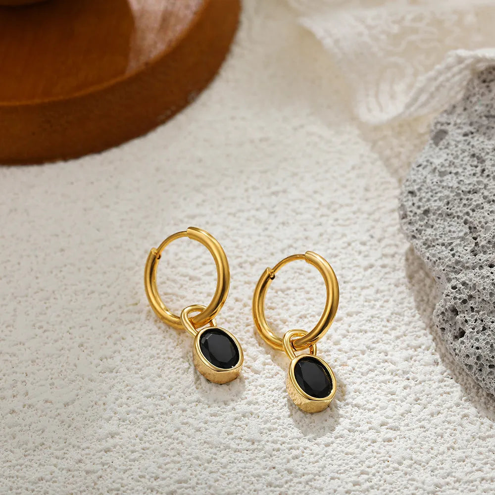 Women's retro-style oval zircon stud earrings in copper, shown in an army green colour variant.