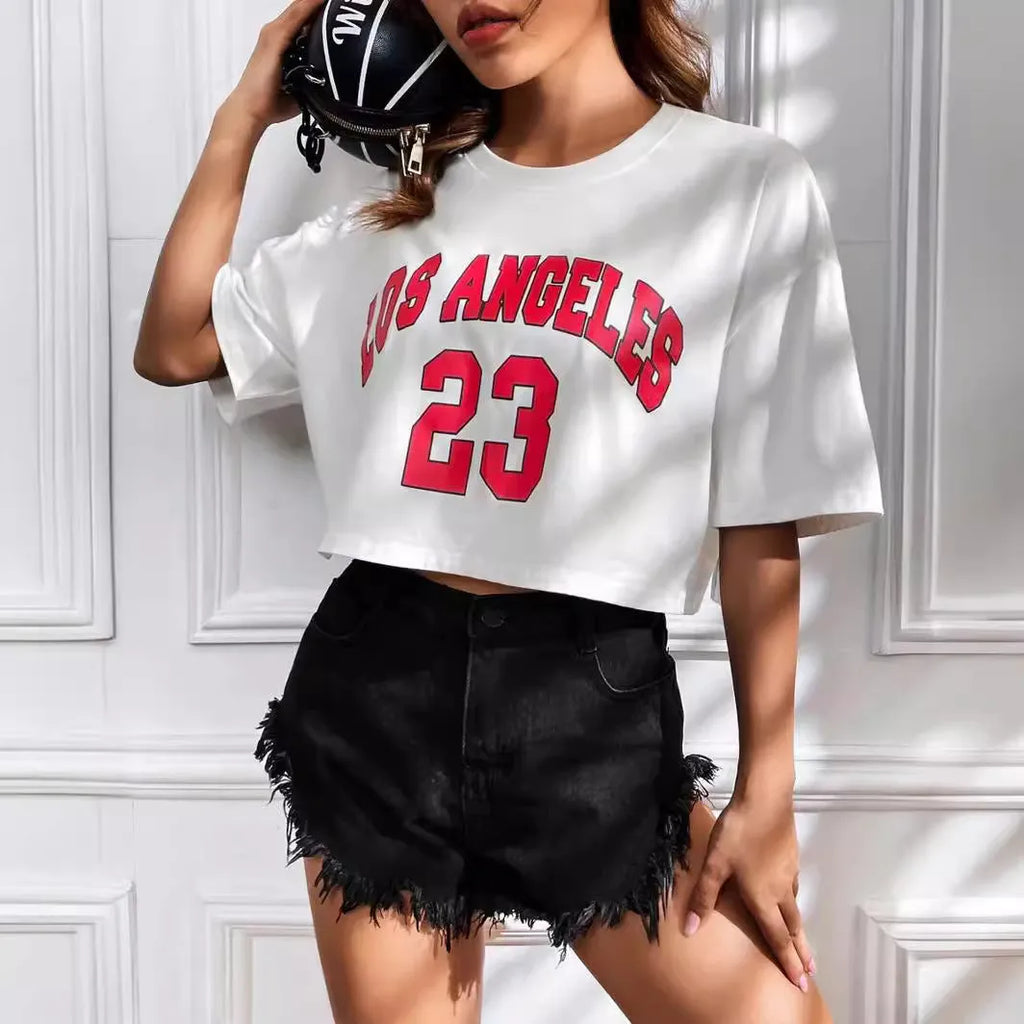 Black cotton crop t-shirt with printed white English letters, short sleeves, and a loose casual fit.