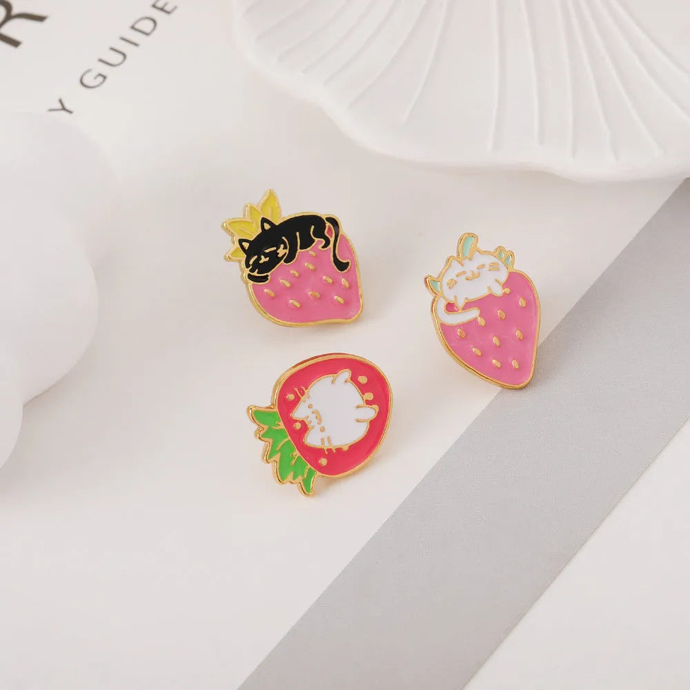 Alloy cake cat brooch with strawberry decoration and dripping oil effect in multiple colour options