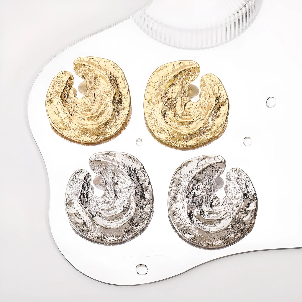 Exaggerated geometric women's earrings with irregular pleating and cold concave-convex texture in gold finish
