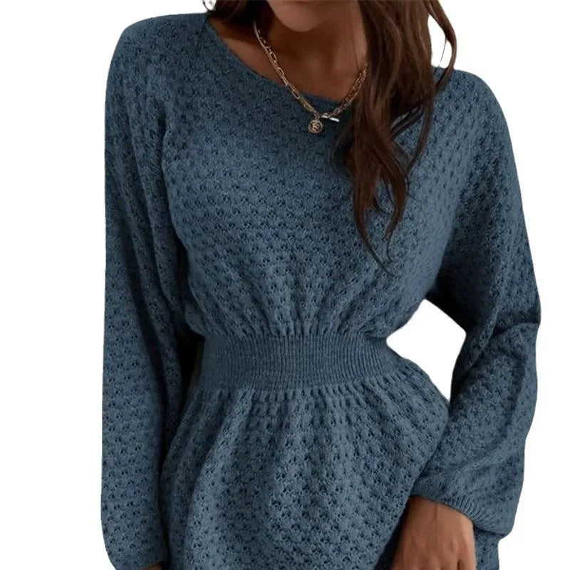 Blue women's knitted dress with crocheted flower details on the front.
