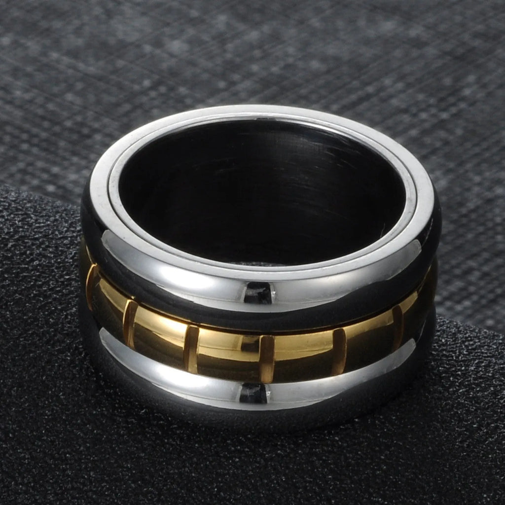 Gold titanium steel ultra-wide knuckle ring with a rotatable tail on a hand