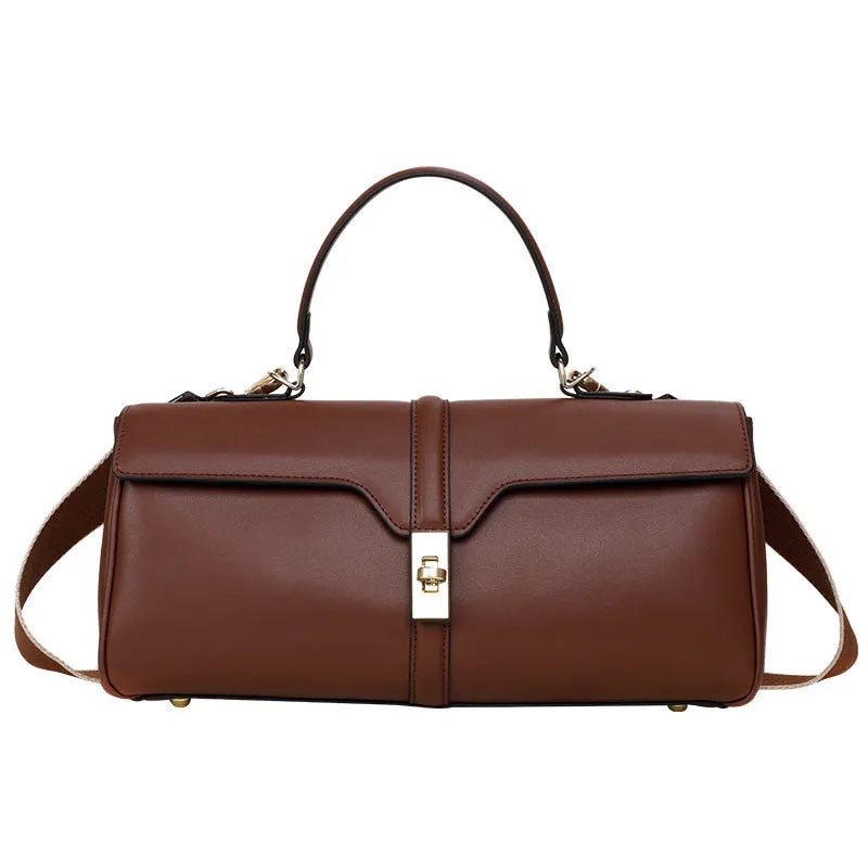 Genuine cowhide leather women's messenger bag in cylindrical suitcase shape with internal organisation compartments
