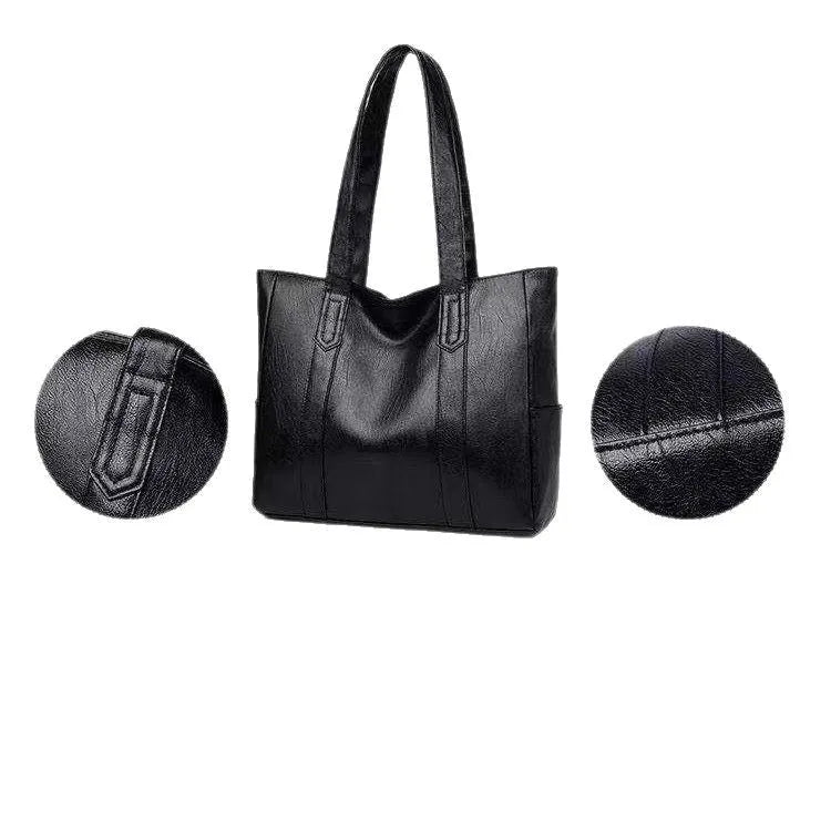 Soft PU horizontal square tote bag with double shoulder straps, black colour, sewing thread detail, and sandwich pocket