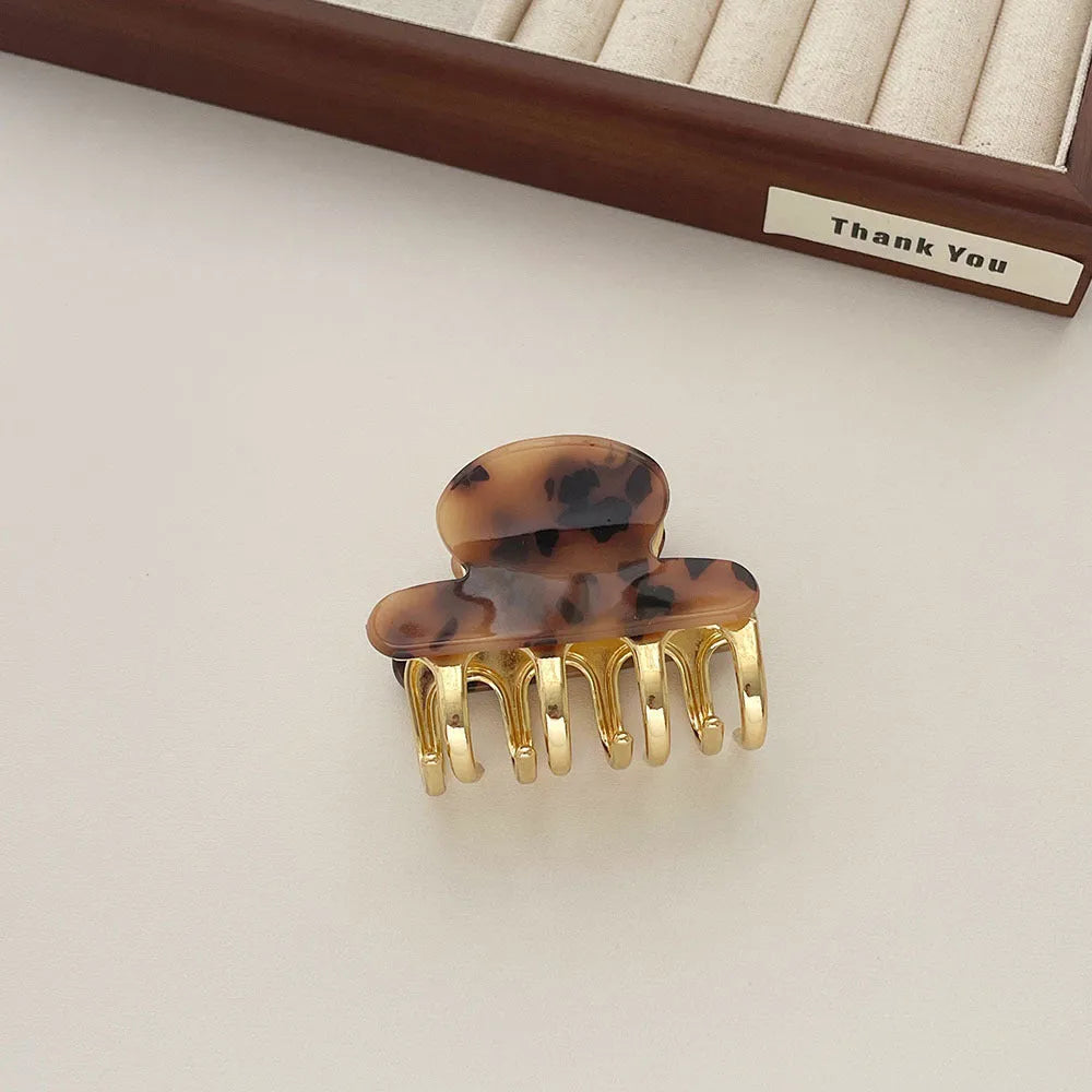 Medium-sized dopamine retro acetate hair clip barrettes with metal grip in four colour variations