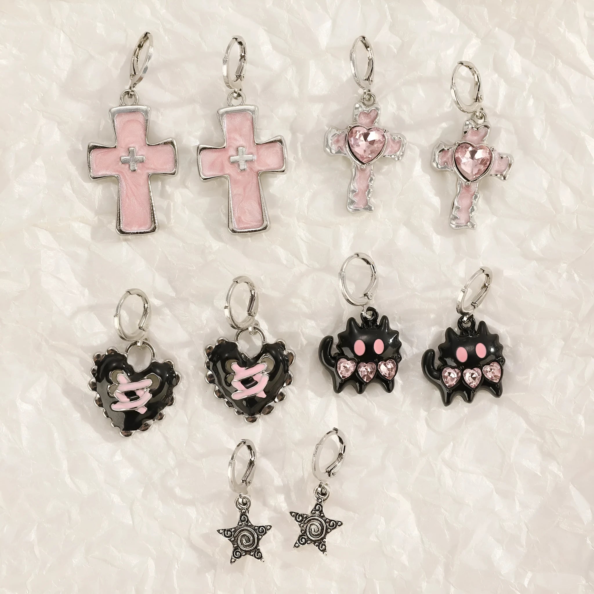 Women's classic cross crystal alloy earrings showing five colour options with cross and heart design elements