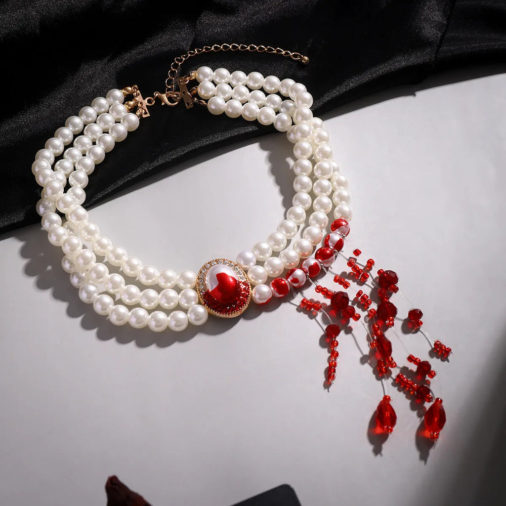 Halloween Gothic jewellery set with pearl collar necklace, matching bracelet and gold stud earrings