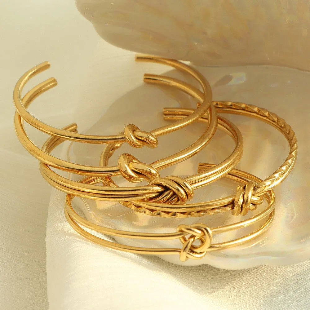 Women's adjustable C-shaped bracelet with double-layer knotted design in gold or silver finish
