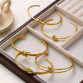 Women's adjustable C-shaped bracelet with double-layer knotted design in gold or silver finish