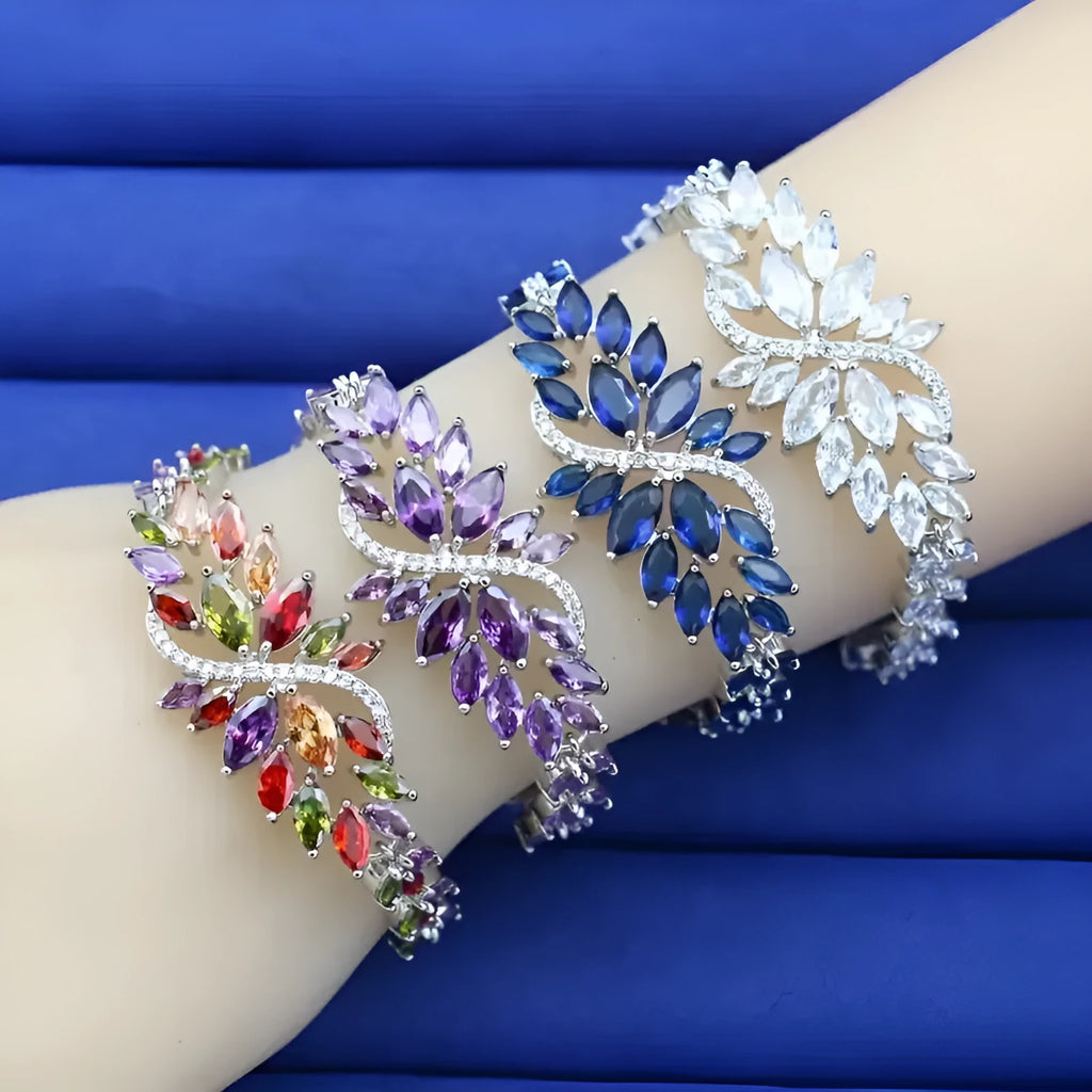 Gold-plated copper bracelet with coloured zircon stones in an ice flower design.