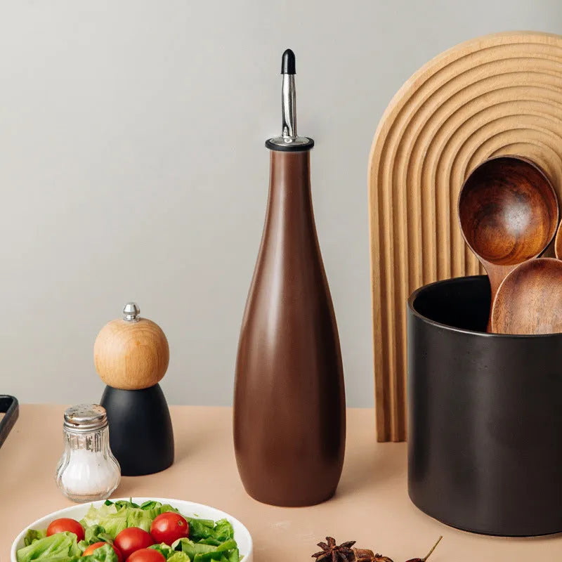 Ceramic oil pot with removable funnel and pouring brush in black, coffee, or white colours