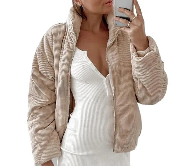 Apricot coloured women's corduroy jacket with a stand collar and full-length zipper.
