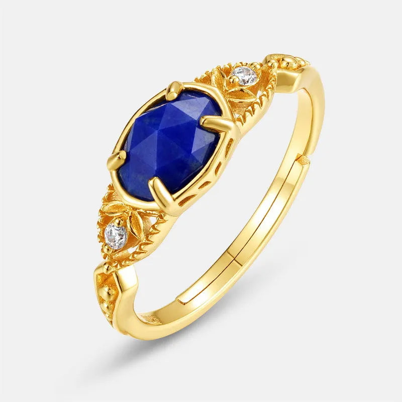 Silver geometric ring with oval lapis lazuli stone showing blue forest night sky pattern