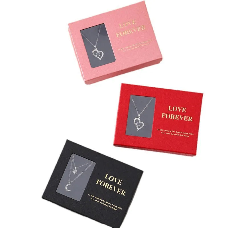 Six red soap roses in a black Korean-style gift box with a matching handbag