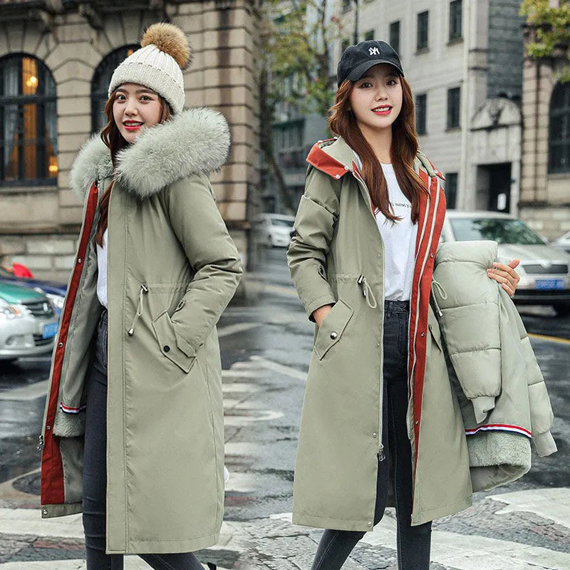 Women's long beige trench coat with two-way zip and cotton padding, shown in extended length.