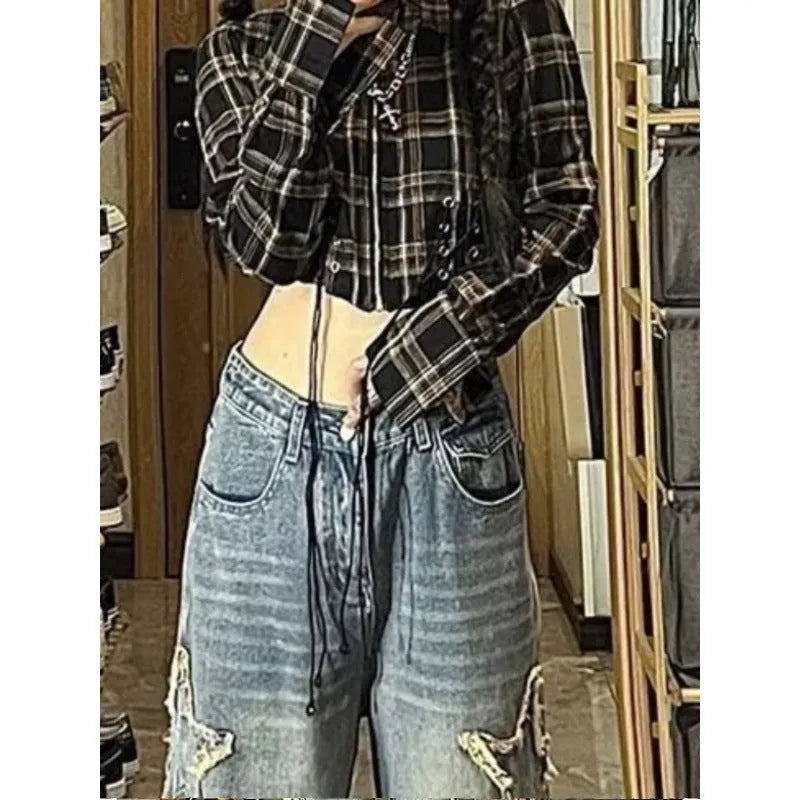 Blue high-waist straight-leg women's jeans on a model, showing the front and side fit.