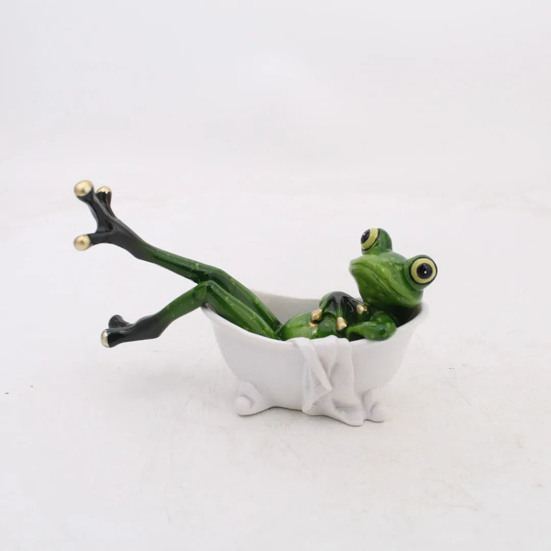 Pastoral style synthetic resin frog ornament with plastic base for shelf or desk decoration.