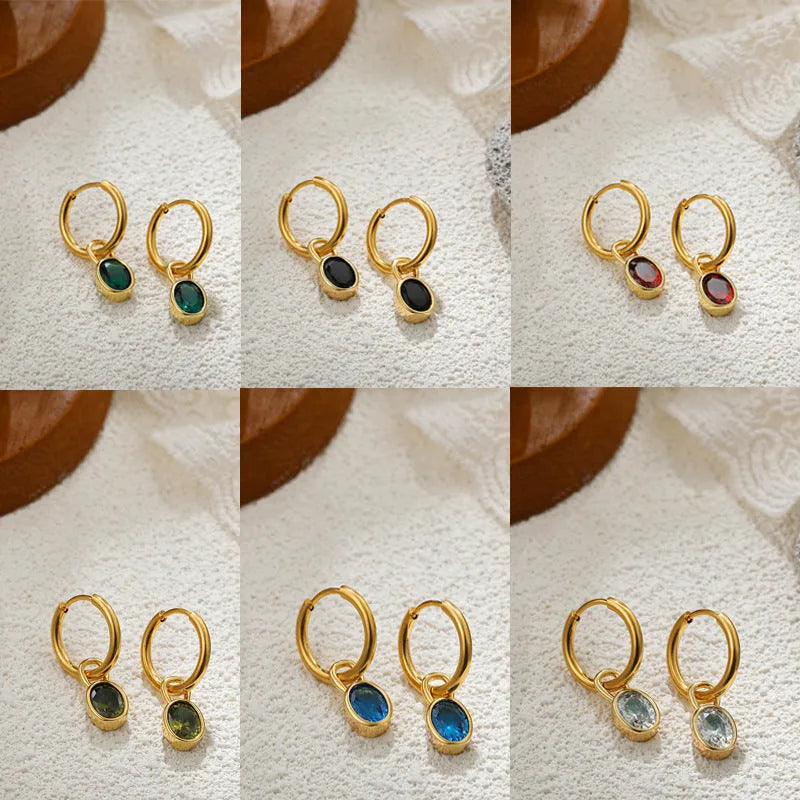 Women's retro-style oval zircon stud earrings in copper, shown in an army green colour variant.