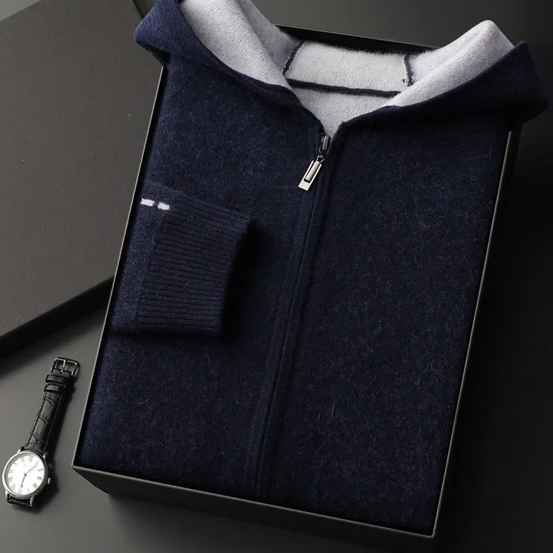 Man wearing a dark blue cashmere cardigan with a half-high collar and zippered front.