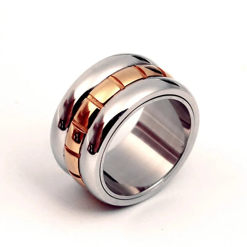 Gold titanium steel ultra-wide knuckle ring with a rotatable tail on a hand